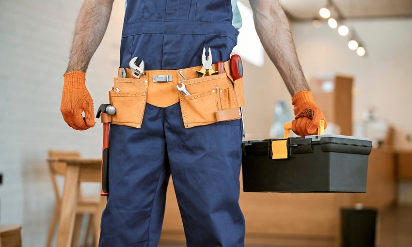 male-electrician-in-gloves-holding-tool-box-set-2022-02-16-18-46-09-utc